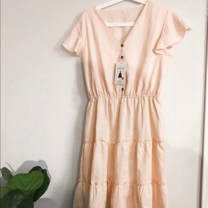 Ivory fit and flare dress with flutter sleeves